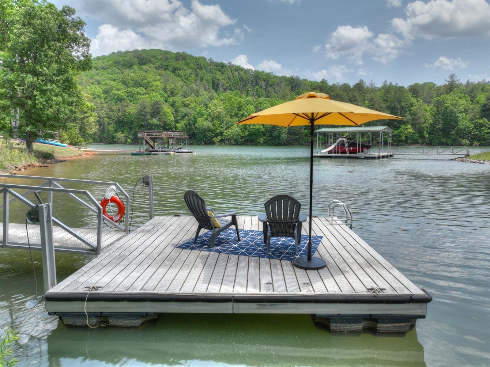 Boat Dock and Chairs on Lake