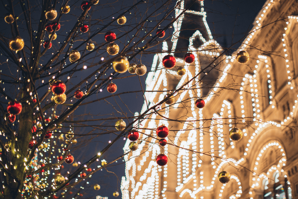 Tree Covered in Christmas Lights and Decorations