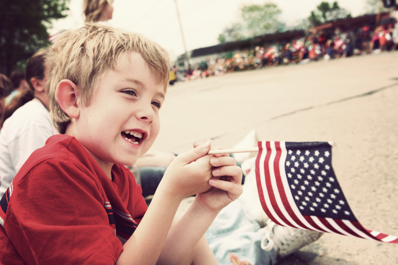 kid holding flag