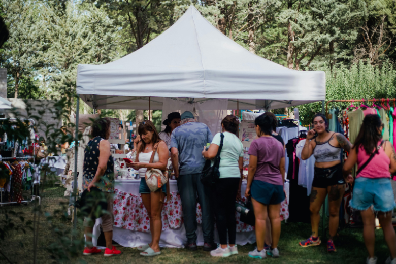Folks Gathered at Market Tent