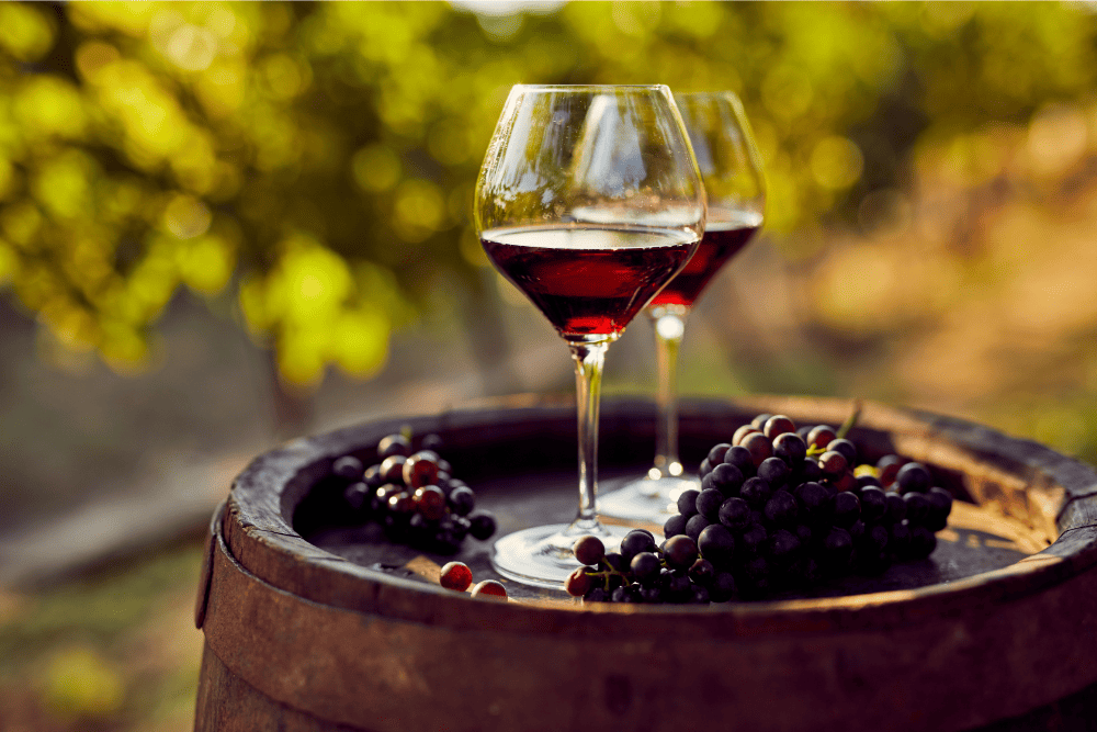 Wine and Grapes on a Barrel